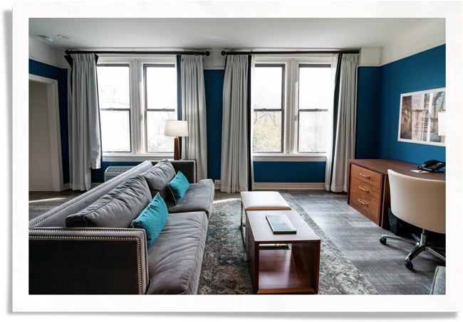 interior view of soundproof apartment with large windows facing the street