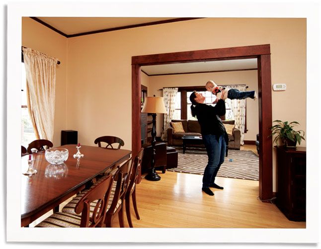 woman and child in home with window with curtains and indow inserts for street noise reduction